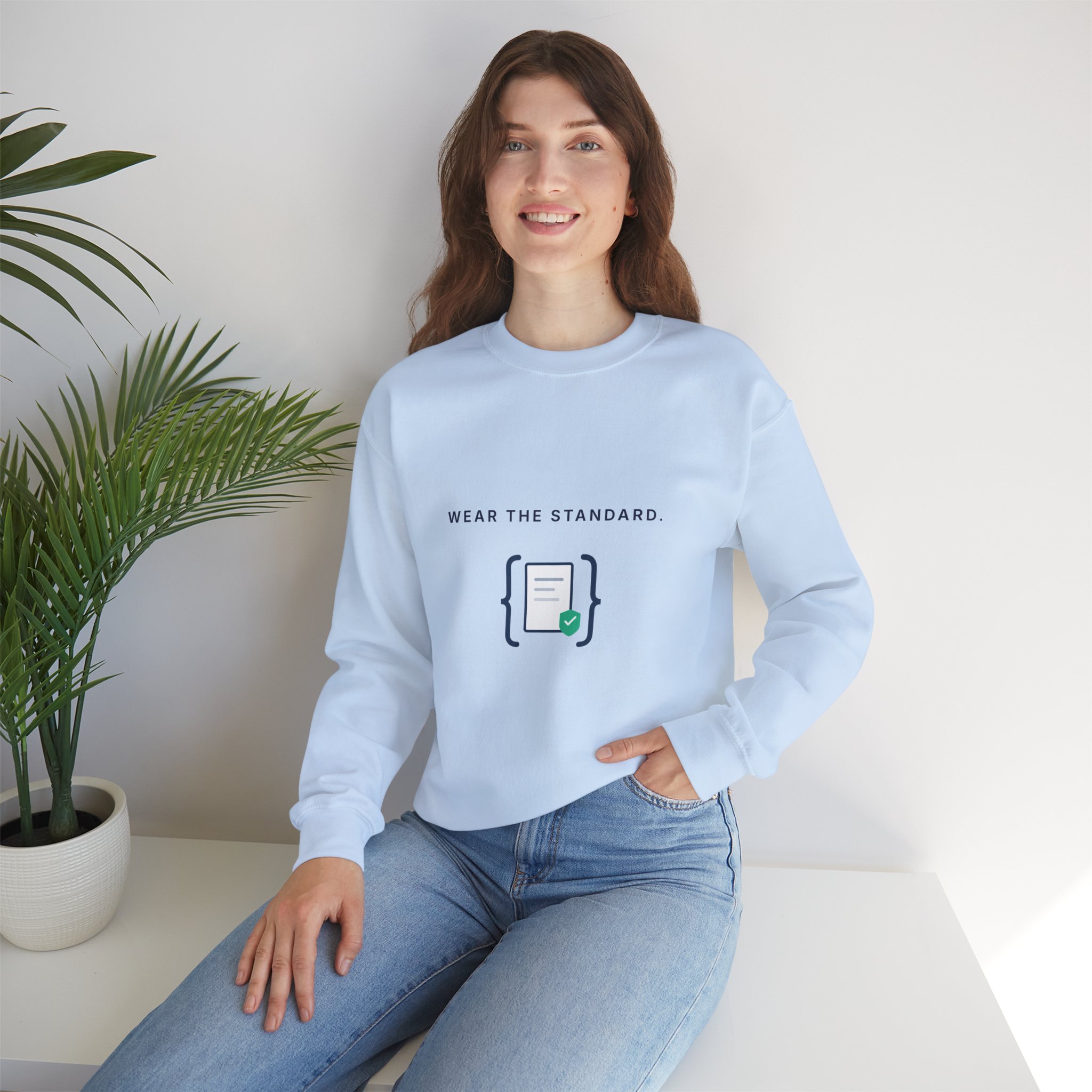A woman wearing the Wear the Standard sweatshirt